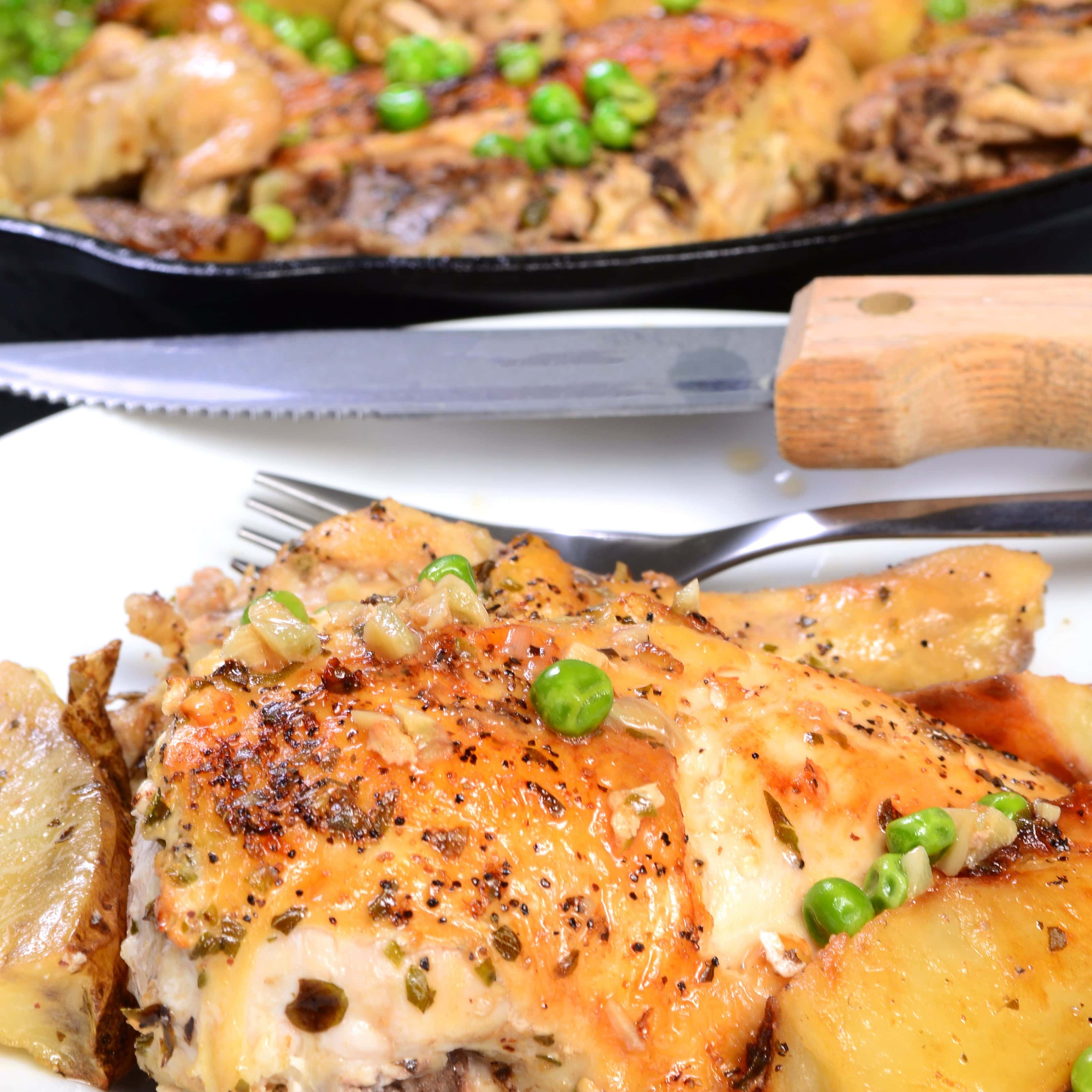 Braised Chicken Thighs with Spring Peas, Lemon, and Leeks Paired with Chablis